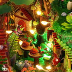 Enchanted forest book nook glowing at night – DIY miniature shelf insert with firefly LED string lights