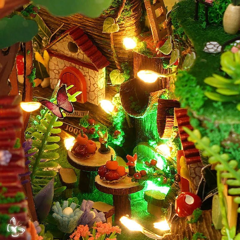 Enchanted forest book nook glowing at night – DIY miniature shelf insert with firefly LED string lights